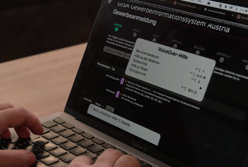 The picture shows the input mask of GISA - Gewerbeinformationssystem Austria - with an open window of a voice-over aid for blind and visually impaired people.