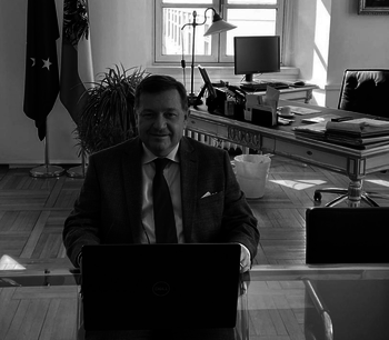 IOI Secretary General Werner Amon in his office